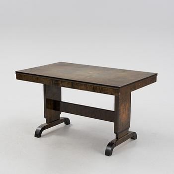 A Swedish Grace birch dining table and four chairs, 1920's/1930's.
