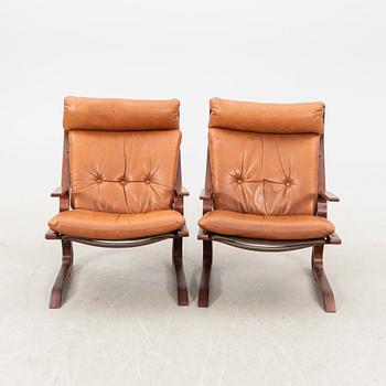A pair of easy chairs from the second half of the 20th century.