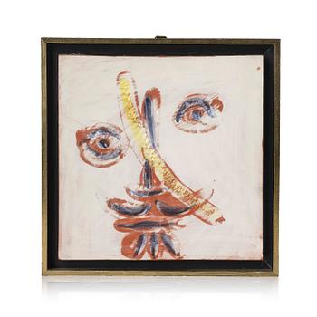 123. Pablo Picasso, a "Visage au trait oblique" (A.R. 589) faience plaque, Madoura, Vallauris, France, post 1968-69.