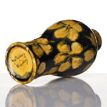 Gunnar G:son Wennerberg, an Art Nouveau glazed creamware vase, Gustavsberg, Sweden, early 20th century.