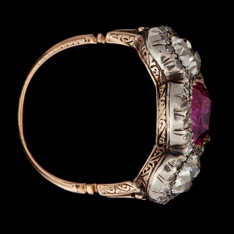 A natural ruby, 3.41 cts, and old-cut diamonds, total carat weight circa 2.00 cts, ring.