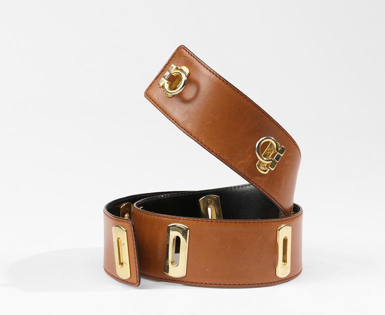 An Escada brown leather belt.