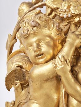 A presumably Dutch Louis XIV carved giltwood frame with mirror glass, in the style of Jean Le Pautre, late 17th century.