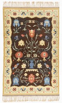 A rug, c. 235 x 155 cm.