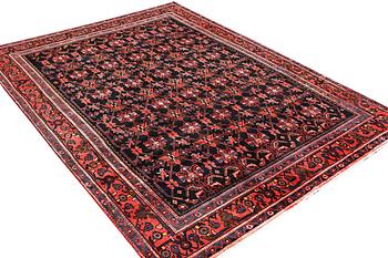 A Borujerd carpet, c. 300 x 225 cm.
