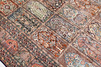 A silk Kashmir carpet, 286 x 265 cm.