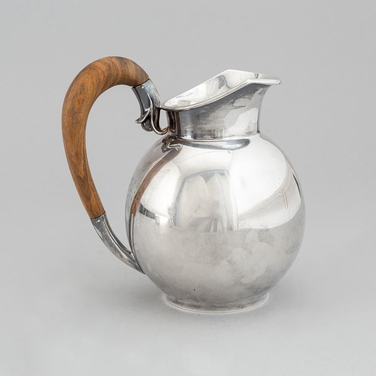 A sterling silver pitcher, Helsinki, Finland 1963.