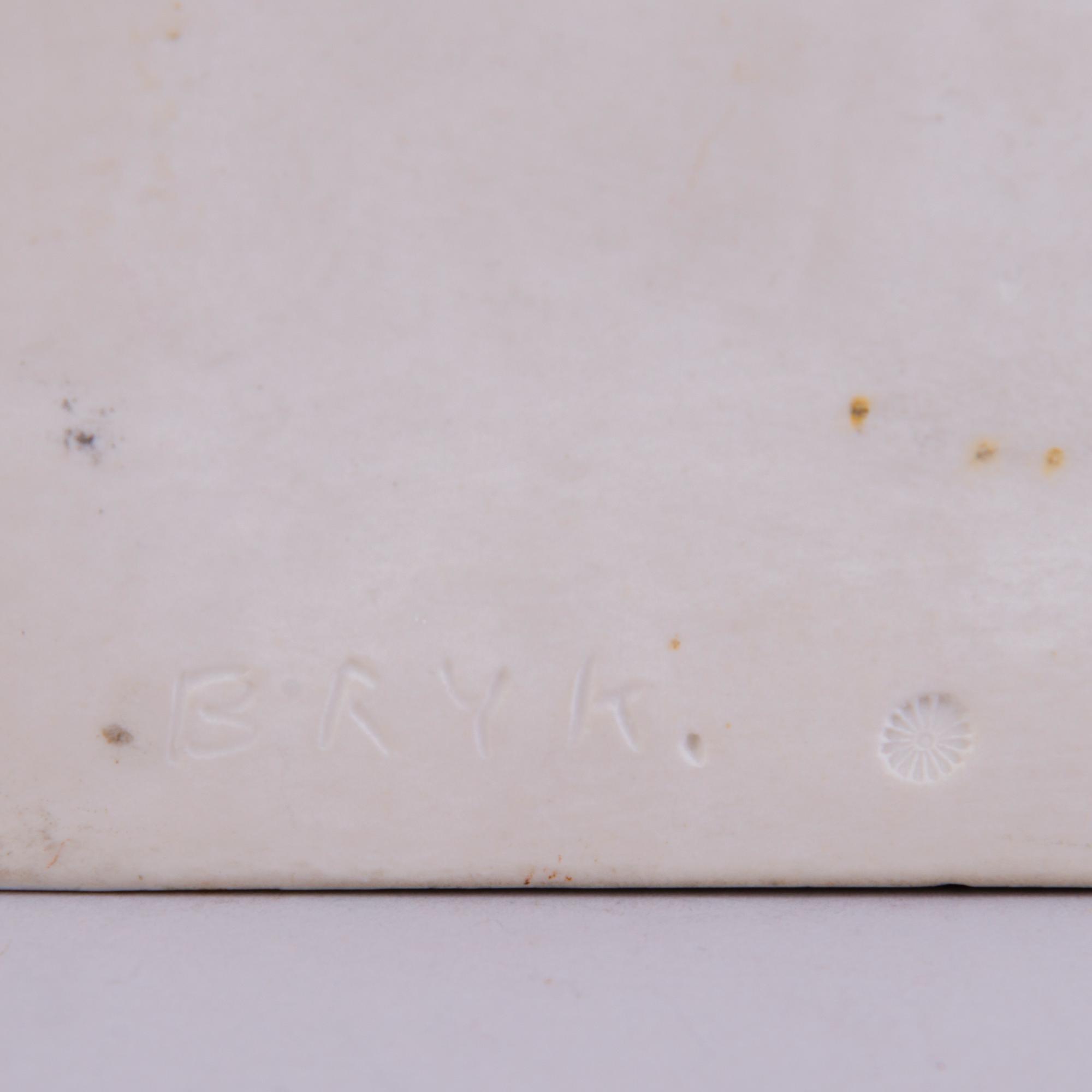 RUT BRYK, A stoneware relief signed a tergo Bryk.