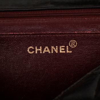 CHANEL, a quilted black leather shoulder bag, "Flap bag".