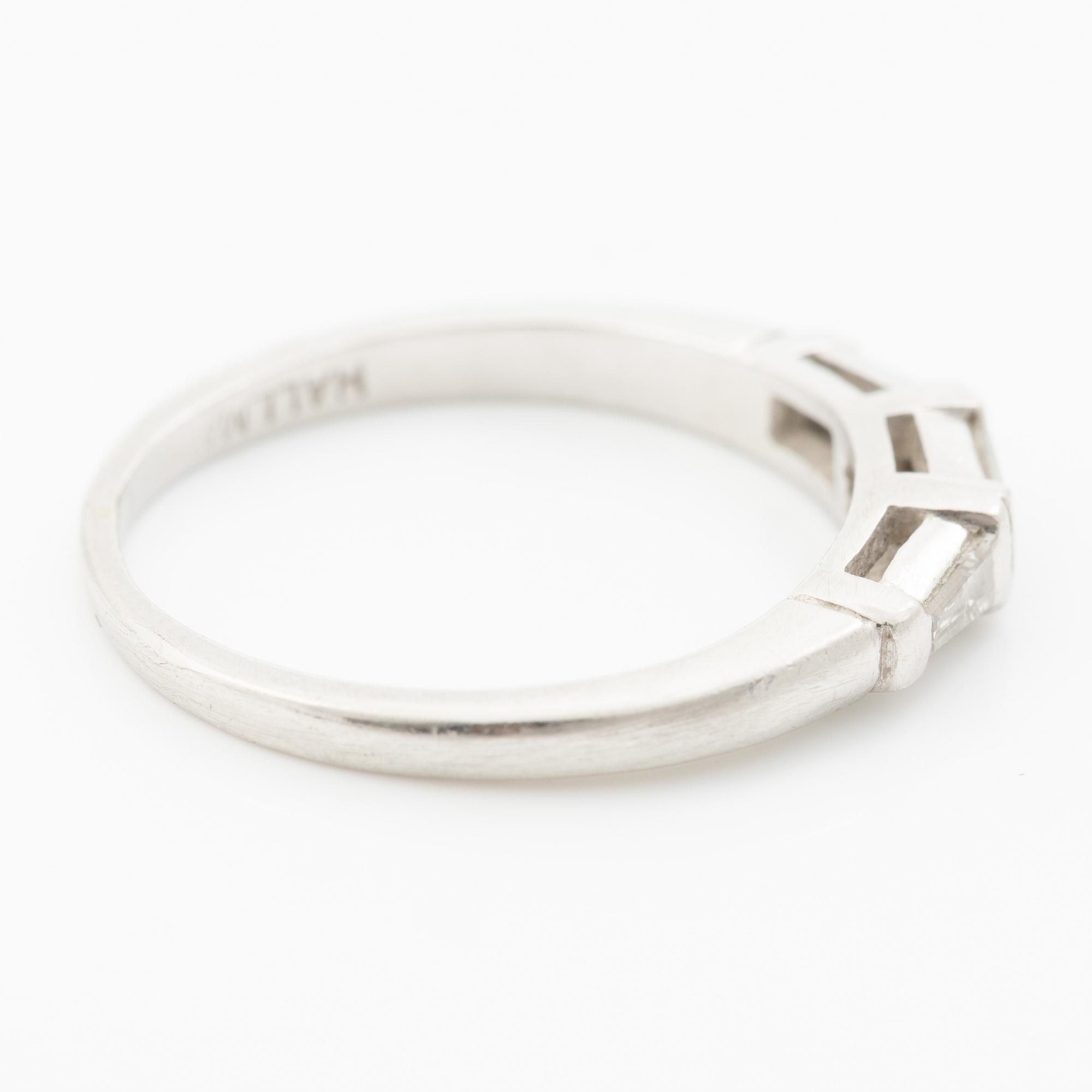 Platinum ring with baguette-cut diamonds.