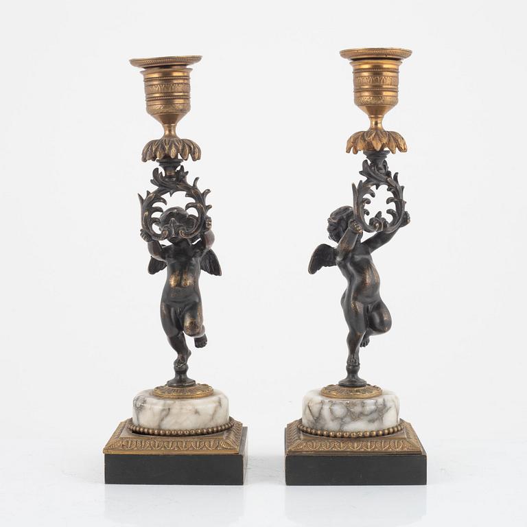 A pair of candlesticks, mid 19th Century.