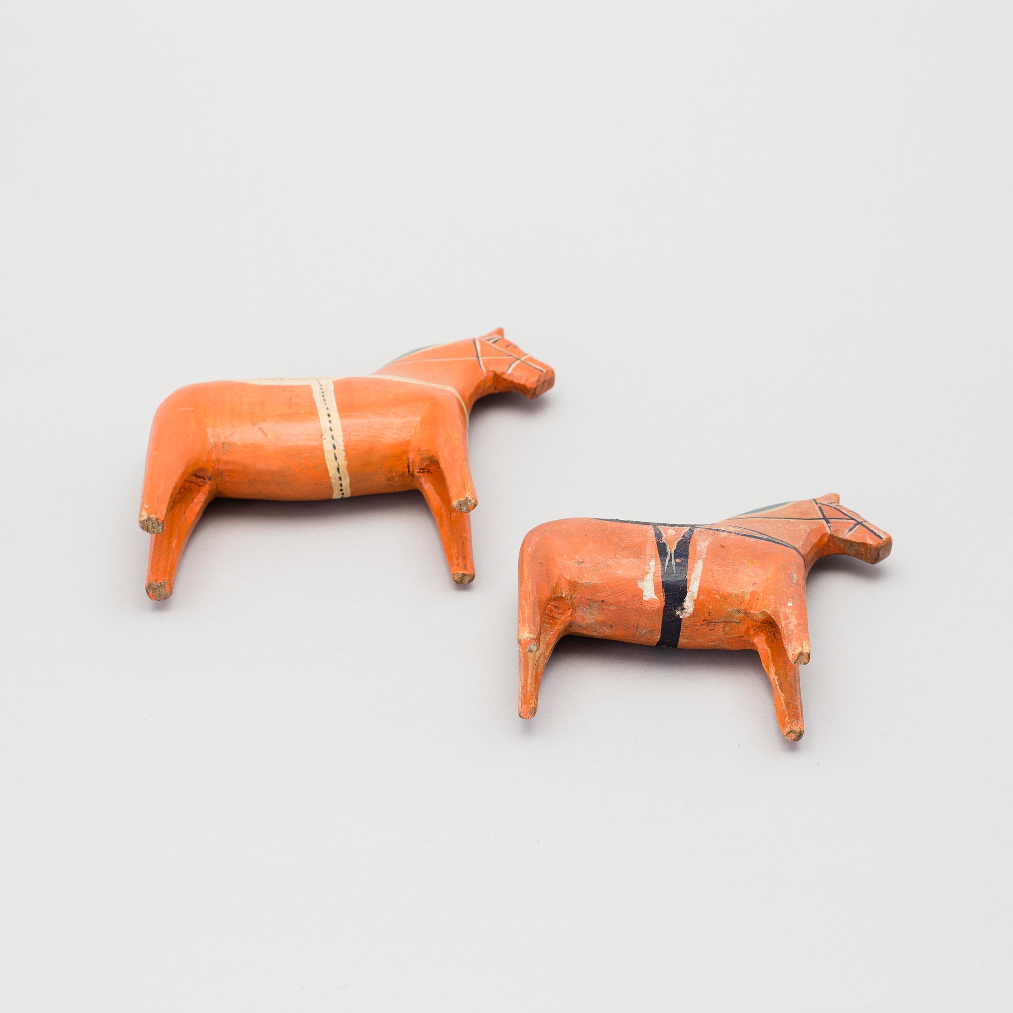 Two painted folk art dala horses first half of the 20th century.