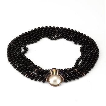 Cartier black pearl necklace clearance