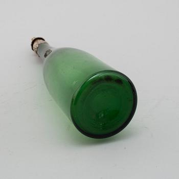 A silver mounted winebottle, Birmingham 1839.