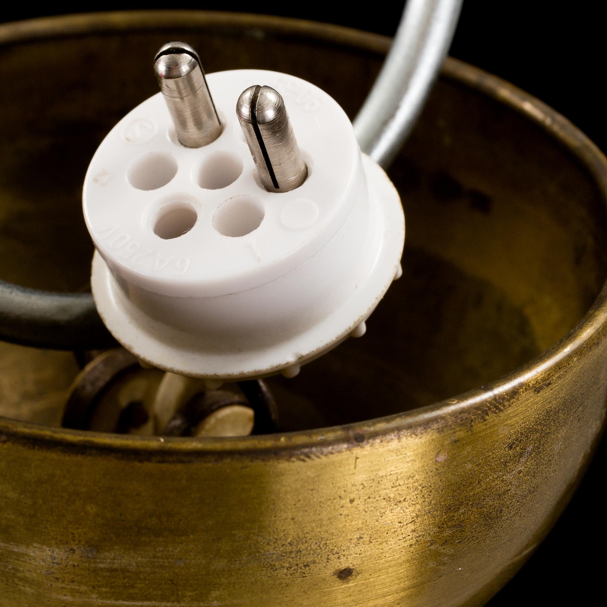 A mid 20th century brass and glass ceiling light. Height ca 67 cm.