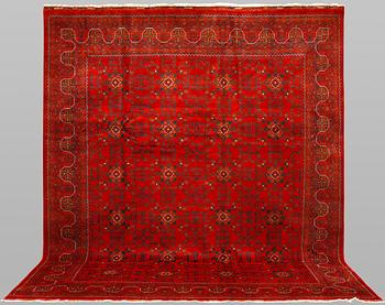 An Afghan rug, c. 298 x 251 cm.