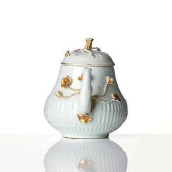 A tea pot with cover and stand, Qing dynasty, 18th century.