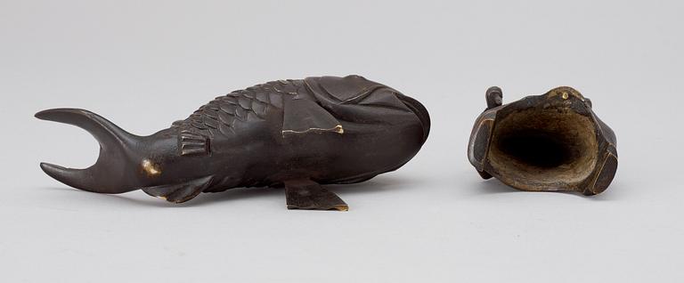 A Japanese Meiji bronze figure, Kinko on a carp.