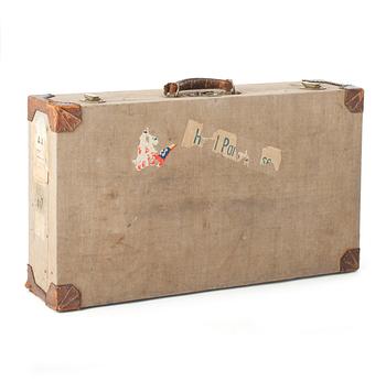 284. HERMÈS, a linen and leather suitcase, early 20th cent.