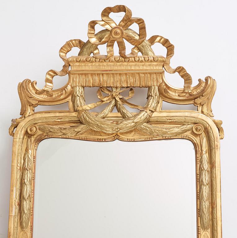 A Gustavian carved and giltwood mirror by J. Åkerblad (master in Stockholm 1758-99).