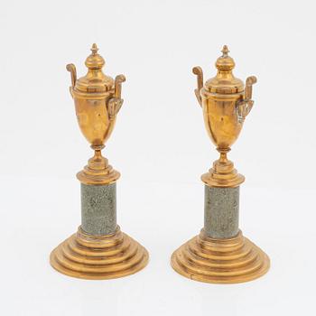 A pair of brass cassolettes from Skultuna Bruk.