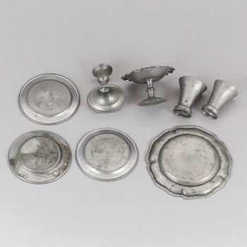 A lot of eight pewter doll house accessories 19th century.