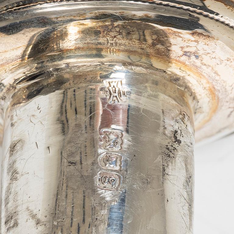 A pair of English silver candlesticks, mark of William Hutton & Sons Ltd, London 1902.