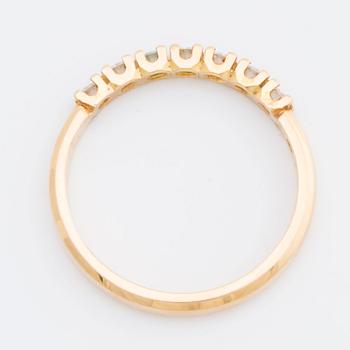 RING 18K gold w 7 brilliant-cut diamonds 0,21 ct engraved. Strömdahl Stockholm 1985.