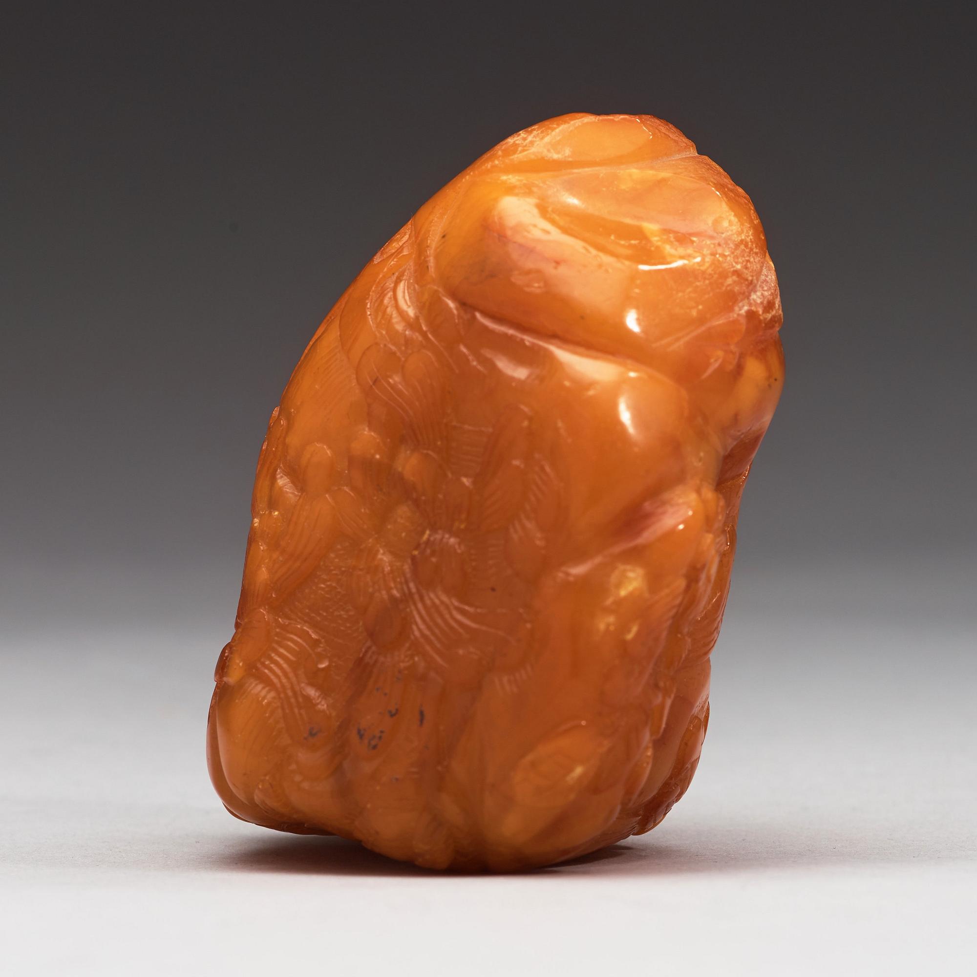 A large piece of sculptured amber, China, presumably first half of 20th Century.