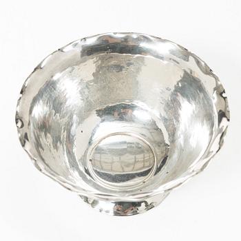 Two silver beakers and a bowl,