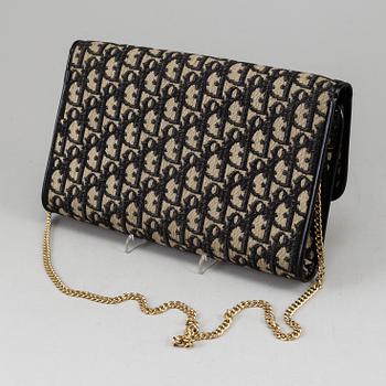 CHRISTIAN DIOR, a monogran  clutch.