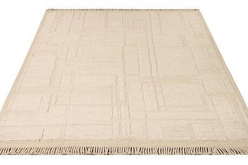 A relief-cut Moroccan carpet, c. 321 x 251 cm.