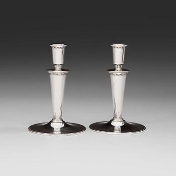 593. A pair of Atelier Borgila sterling candlesticks, Stockholm 1934.