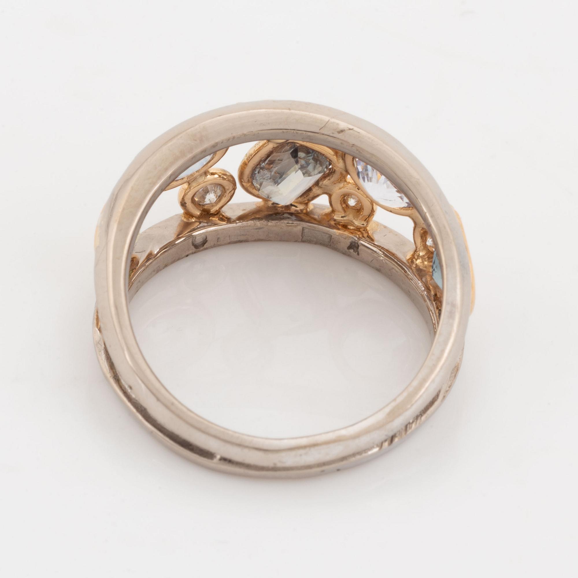 Multi colooured sapphire and brilliant cut diamond ring.