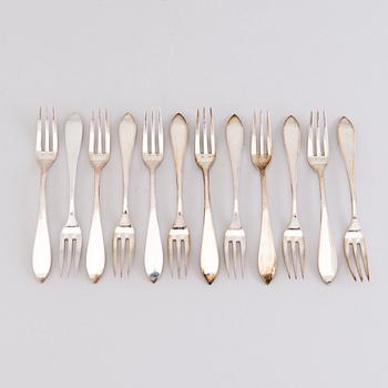 A 1920s 88-piece set of silver cutlery and 12 knife handles, Warsaw Poland.