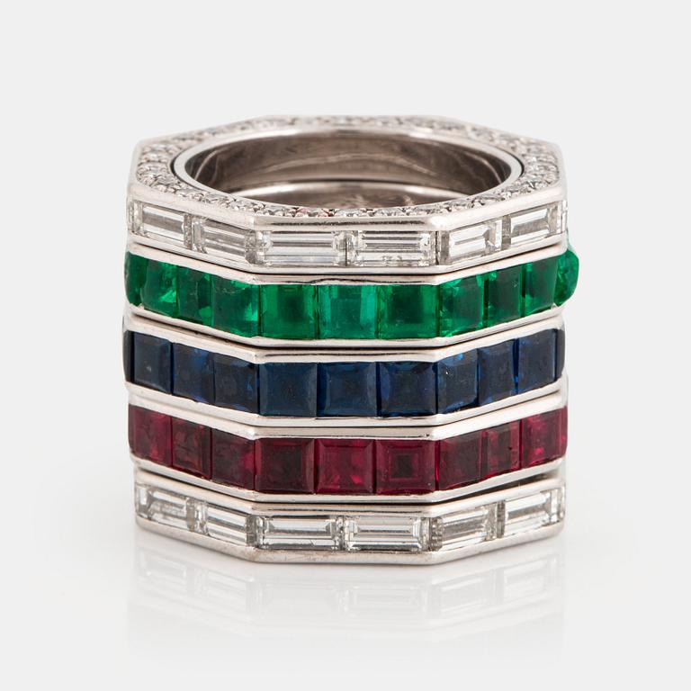 Five Paul Binder rings in 18K white gold set with baguette- and round brilliant-cut diamonds.