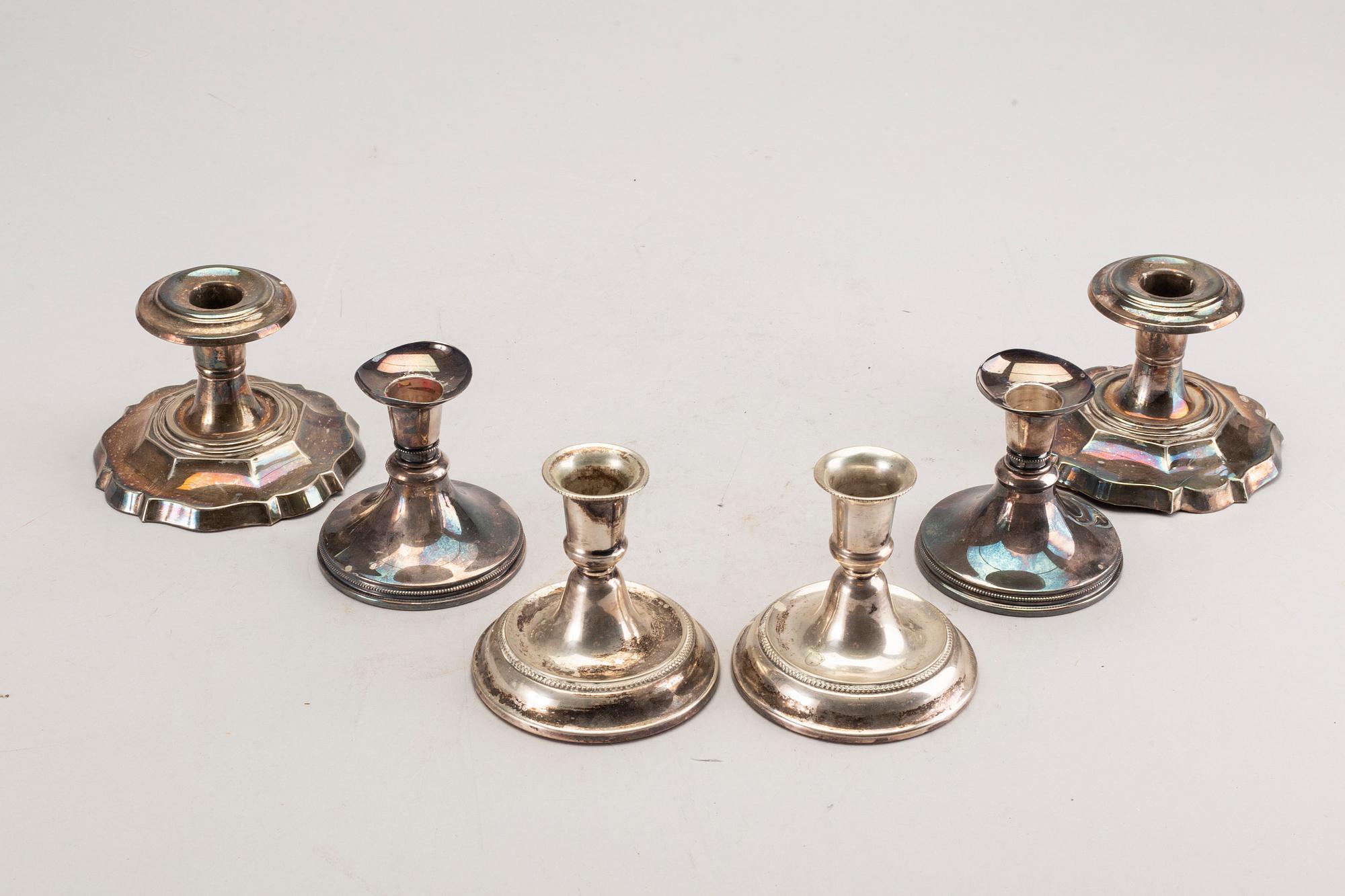 A set of three pair of Swedish 20th century silver candle sticks.
