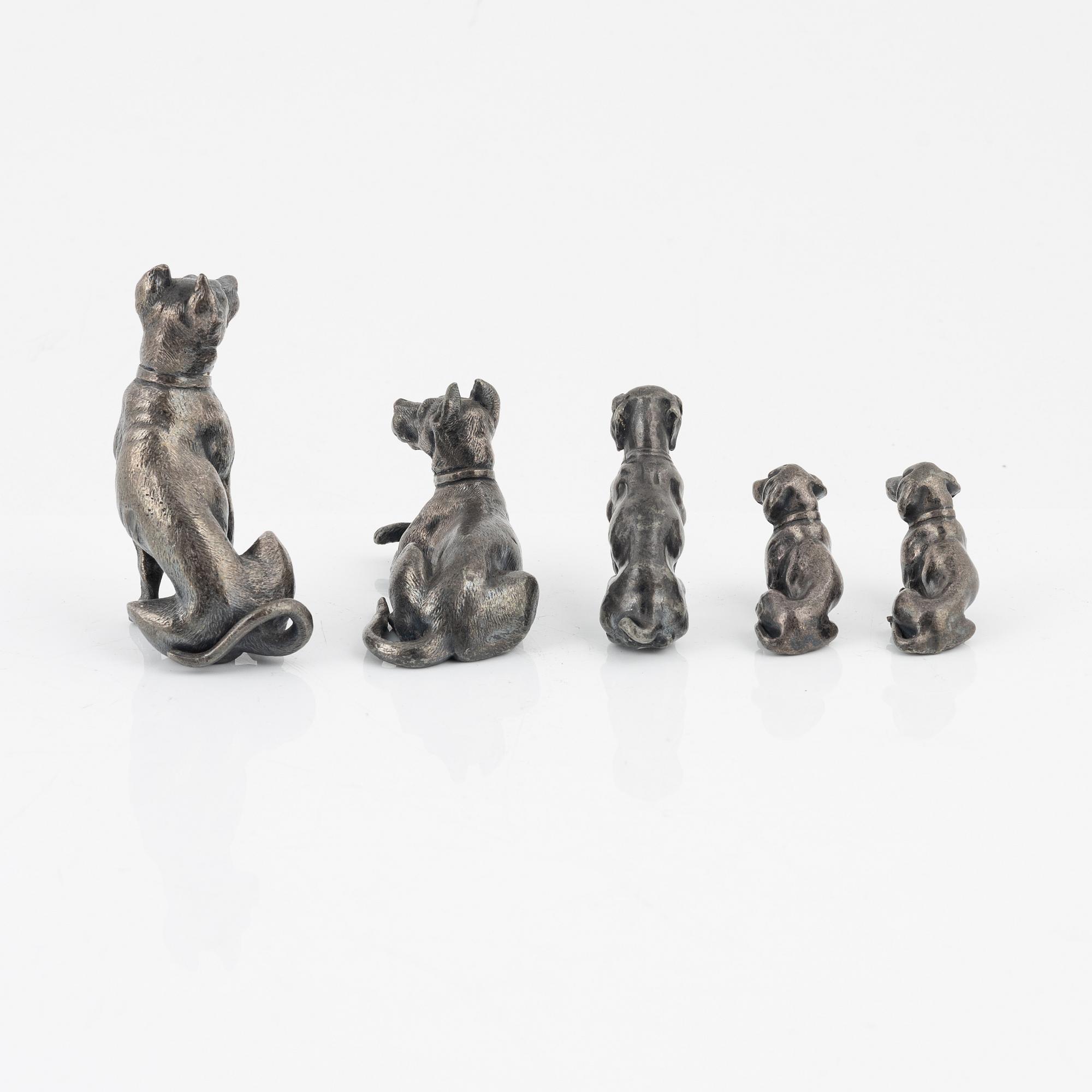 Five metall dog figurines, two stamped WMF (Würtembergische ...