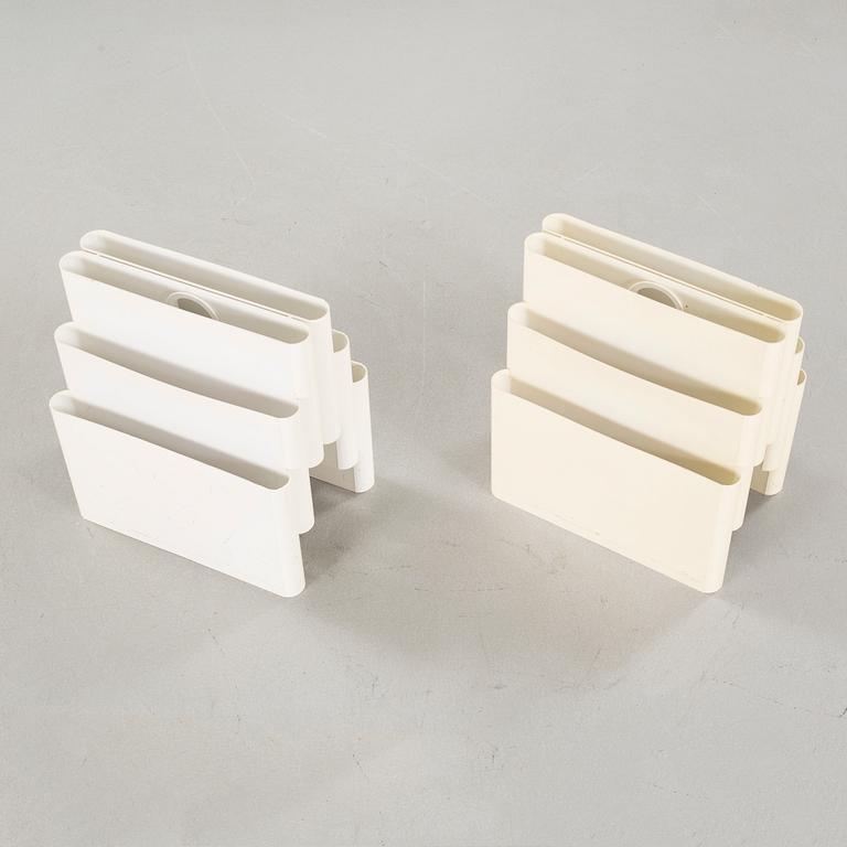 A pair of magazine racks, designed by Giotto Stoppino  for Kartell.