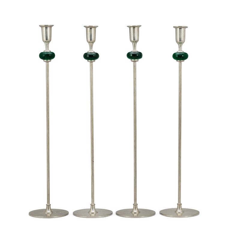 Estrid Ericson, An Estrid Ericson set of four pewter and green glass candlesticks, Svenskt Tenn, Stockholm 1960.