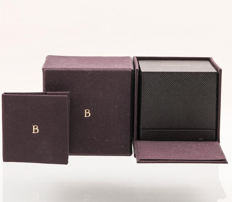 A “Quatre” ring in 18K yellow, pink, white gold and brown PVD by Boucheron.