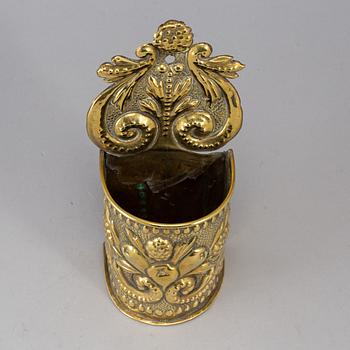 A 19th century brass spoon holder.