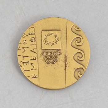 Deltagarmedalj OS, Aten 2004 samt tygmärke för den svenska OS-truppen.