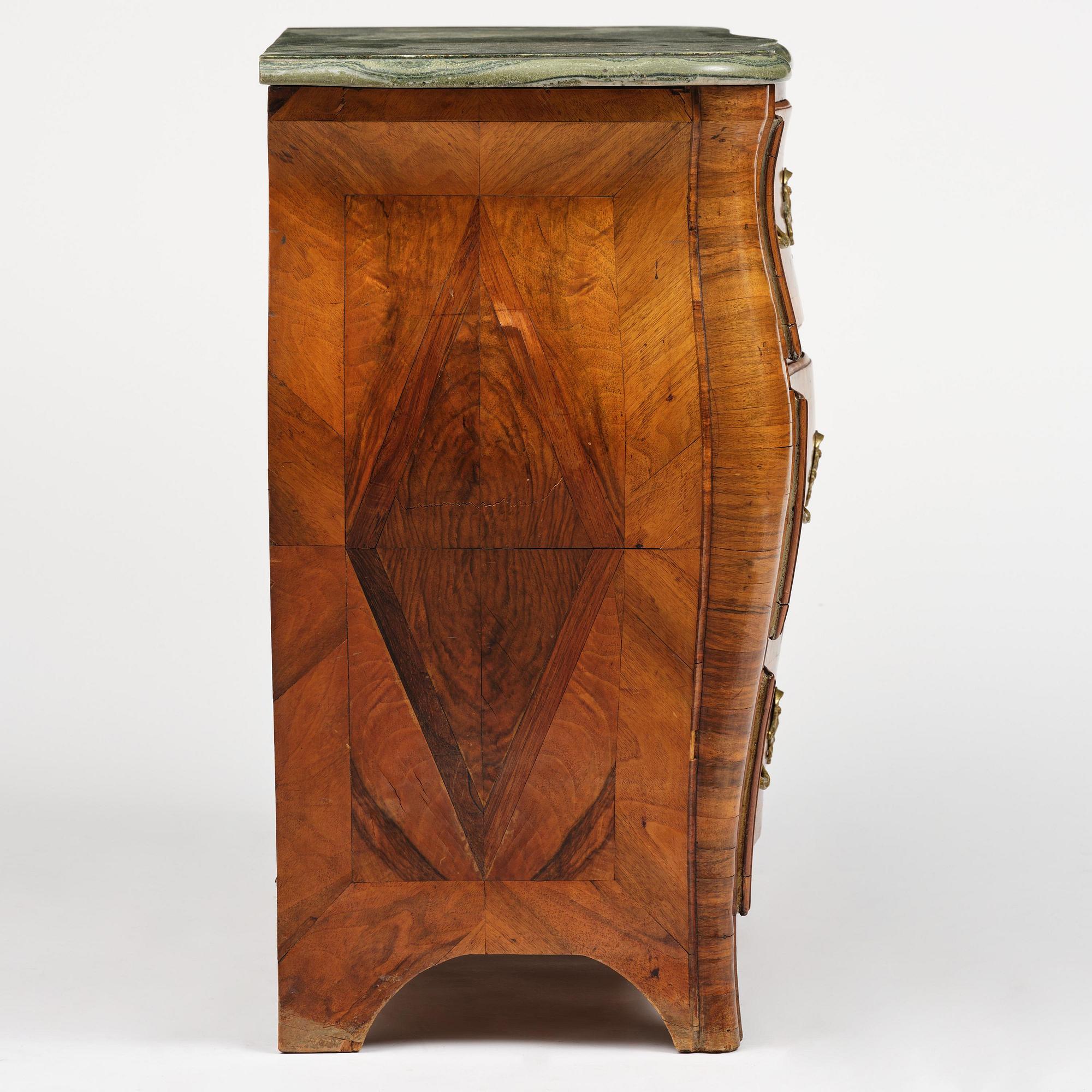 A Swedish rococo parquetry commode by C. Linning (master in Stockholm 1744-79).
