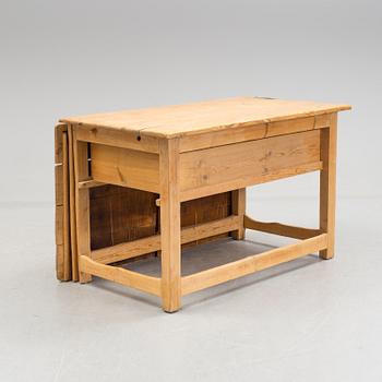 A 19th century pine flap table.