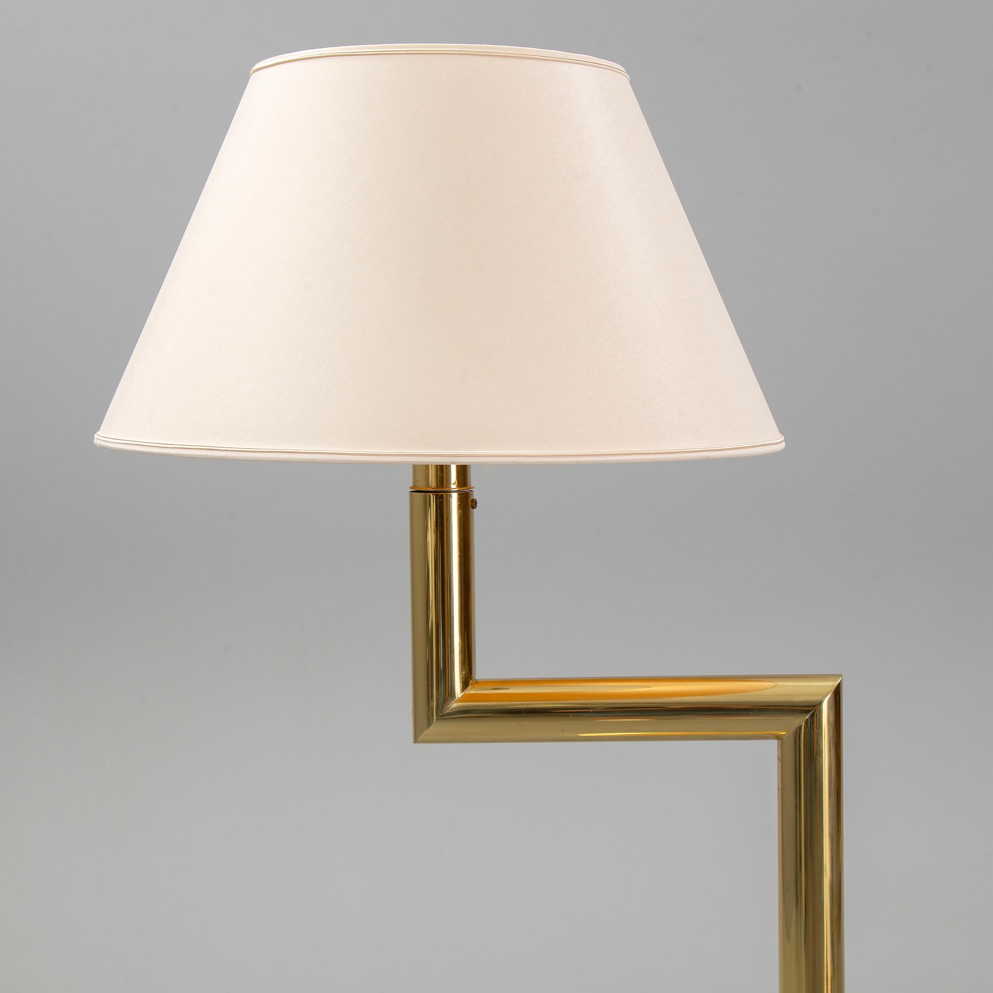 A brass floor light, 1970's.