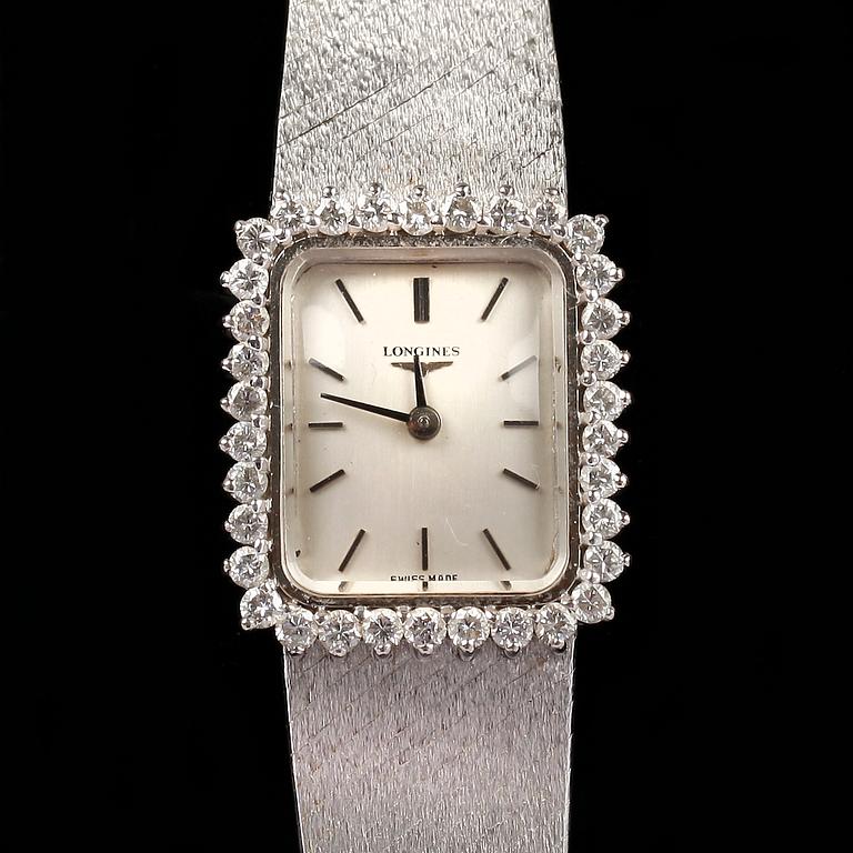 ARMBANDSUR, 18k vitguld med briljantslipade diamanter ca 0,60 ct. "Longines", cikt tot ca 42 g.