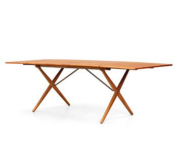 353. Hans J. Wegner, a teak and oak drop-leaf dining table, Andreas Tuck, Denmark 1950'-60's.