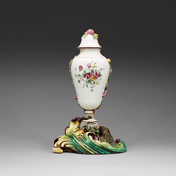 1537. A Swedish Marieberg faience vase with cover, dated 1771.