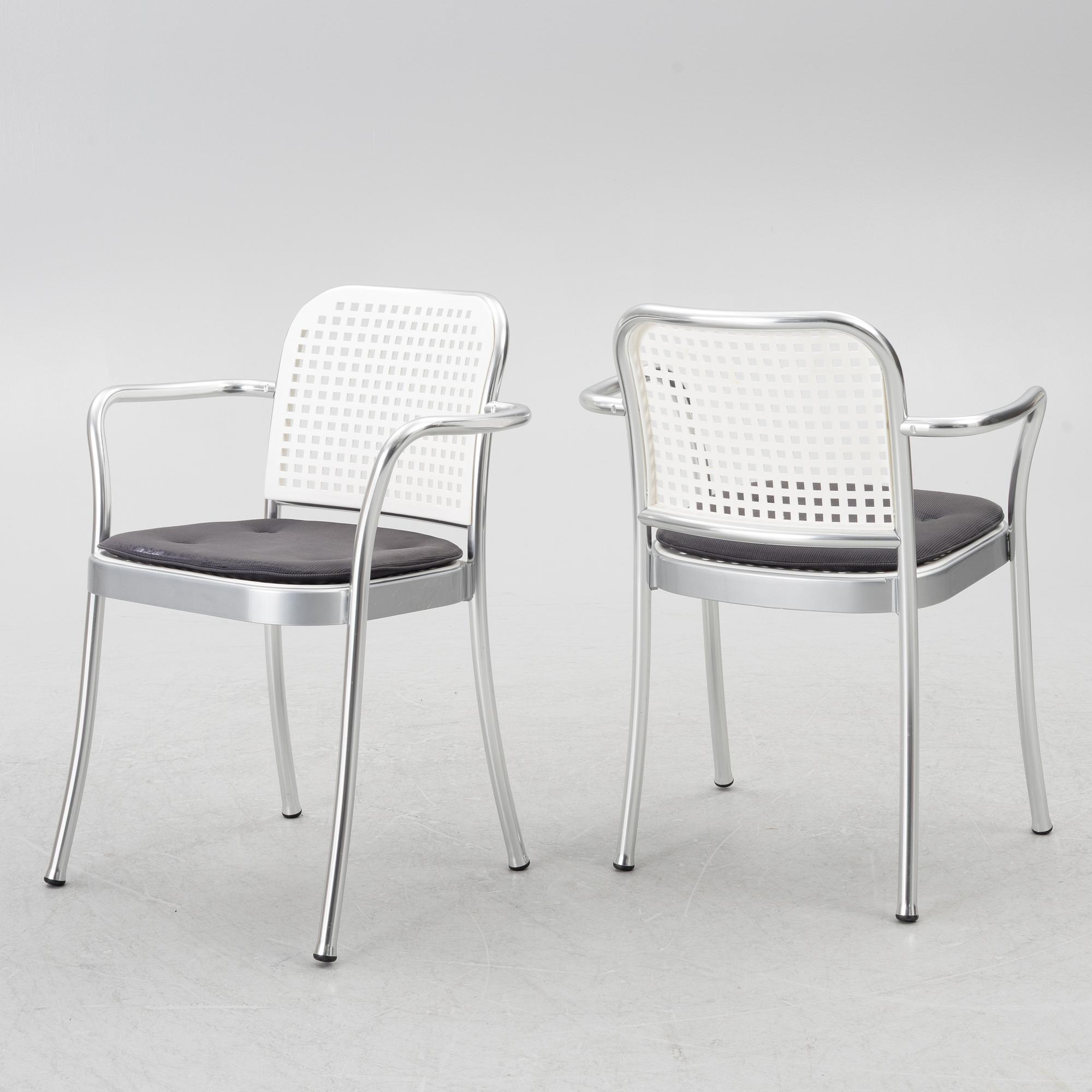 Vico Magistretti, a "Shine" dining table with twelve chairs, De Padova, Italy, around the year 2000.